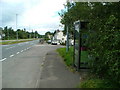 Looking along the A4042(T) with phone box