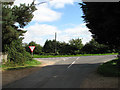 Approaching junction of Green Lane with Holt Road (B1149)