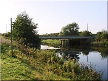 TL6699 : The B1160 road bridge over the Cut-off Channel by Lisa Wild