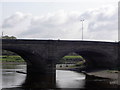 Walton Bridge, with fishermen beyond