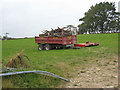 Trailer and logs at Cochsiden