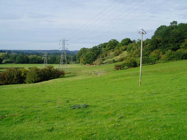 Electricity pylons crossing farmland