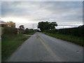 NY2953 : Road through Wiggonby by Alexander P Kapp