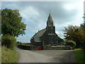 SN3815 : Llangain church by David Medcalf