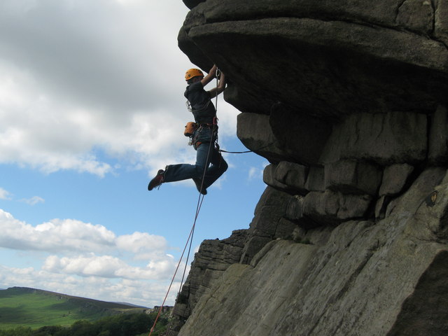 Climber at Stanage Edge