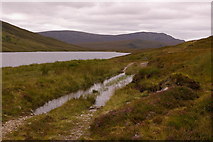 NH2794 : A wet track beside Loch an Daimh by Ian Capper