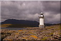 NH0997 : Rubha Cadail lighthouse with Ben More Coigach behind by Ian Capper