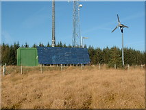 SN8963 : Green radio mast with solar panel and wind generator by Jerry Elston