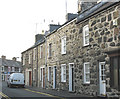 Tai yn Ala Uchaf.    Houses in Ala Uchaf