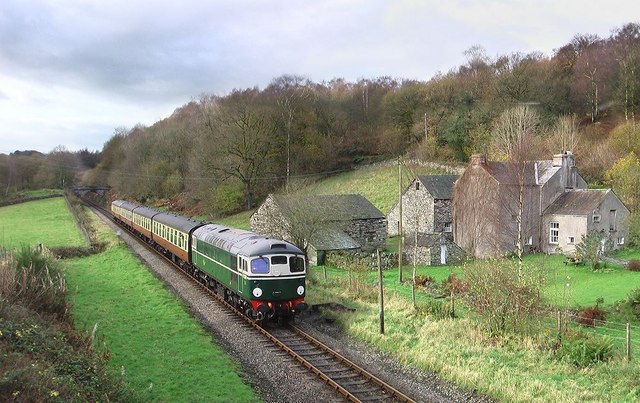 Train passing Waterside House near Newby Bridge