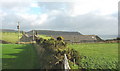 Approaching the rear of Cadlan along the Llyn Coastal Path