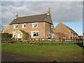 The farmhouse and barn at West Side