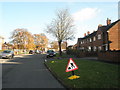 Temporary roadworks sign in Woodgreen Avenue