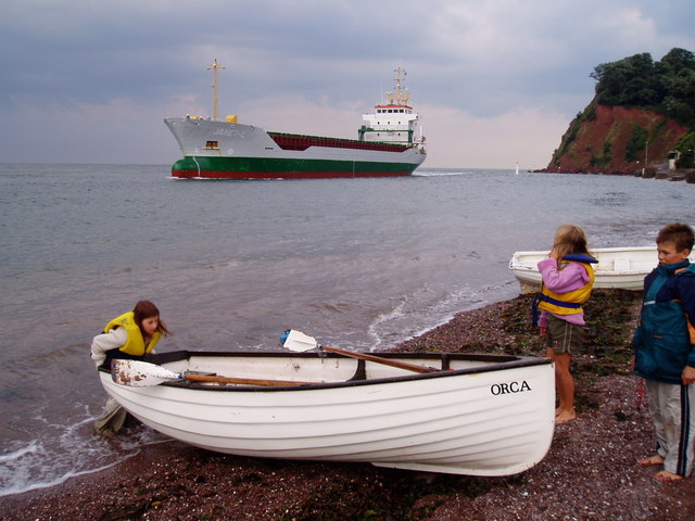 The coaster the 'Janet-C' passing The Ness at Shaldon