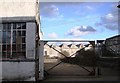 Derelict industrial buildings opposite Camborne station