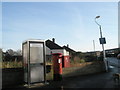 Phone box doubling up as a shower cubicle