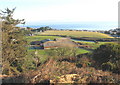 View across Castellmarch Farm towards the Warren Caravan Park