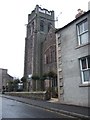 A church with tower on Coldstream High Street