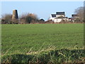 TL9658 : View across fields to disused windmill by Andrew Hill