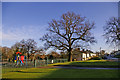 Playground and houses in eastern end of Lonsdale Drive, Enfield