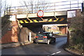 TM0954 : Low railway bridge, B1078 at Needham Market by Andrew Hill