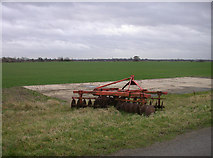 TL4764 : Disk harrow in fields at Middle Farm by Keith Edkins