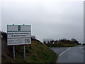 Road junction with mysterious sign