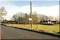 Logie Newton and signpost for Wells of Ythan