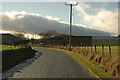 Road at Logie Newton and farm buildings