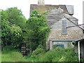 The Old Water Wheel and Millhouse at Orleigh Mill