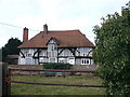 Claxfield Farm house, taken from Claxfield Road, near the junction with the A2