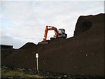 ST4638 : Moving the peat by Sharon Loxton