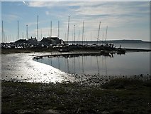 SZ1891 : Mudeford: the mud catches the sun by Chris Downer