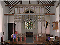 TL9997 : St Peter's church - rood screen by Evelyn Simak