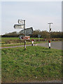 Fingerpost  and brown sign to Gadfield Elm Chapel