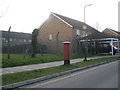 Postbox by small field in Matapan Road