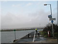 Cyclist on the coastal path at Hilsea