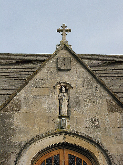 Statue of St. Giles in a niche above the porch