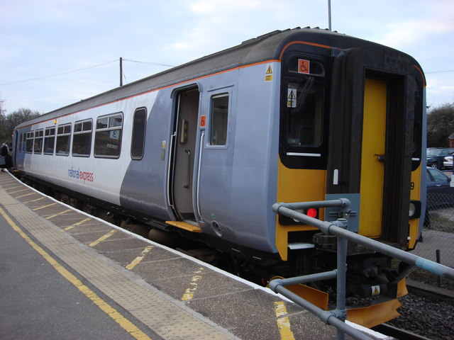 Class 156 in new livery at Marks Tey platform 3