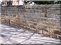 Bricked up windows in wall of Wadsley School