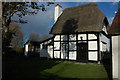 Timber-framed thatched cottage, Baughton