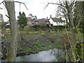 Village houses by the River Og