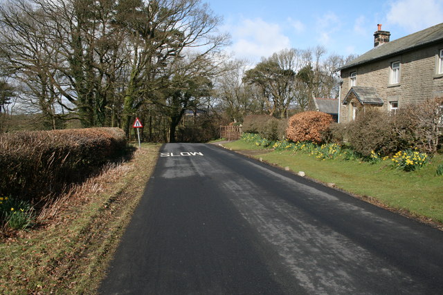 House and road near Hangington Clough Bridge