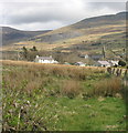 View across fields behind the High Street to Llandinorwig church and Capel Cefnywaen