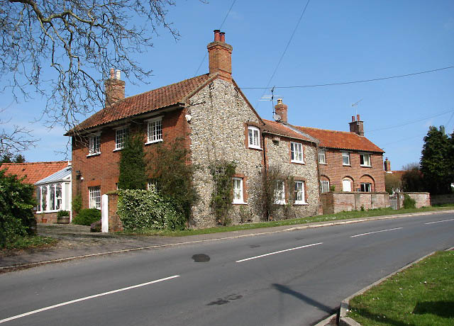 Houses beside the B1110 (Holt Road)
