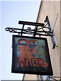 ST5874 : Cat and Wheel pub sign by Natasha Ceridwen de Chroustchoff