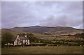 SH5654 : Farmhouse and sheep, Snowdon in background taken 1965 by Christine Matthews