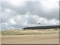 SH3075 : A hangar behind the dunes by Eric Jones
