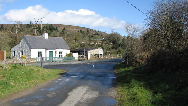 Road junction and cottage © Willie Duffin cc-by-sa/2.0 :: Geograph Ireland