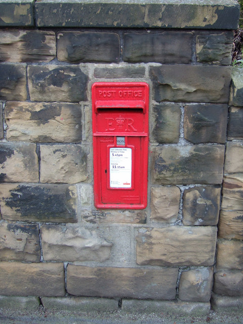 Post box within a garden wall at the top of Batley Field Hill